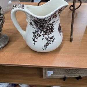 Two's Company cream and brown floral transferware pitcher.